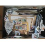 Box containing packet stamps and first day covers.