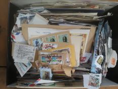 Box containing packet stamps and first day covers.