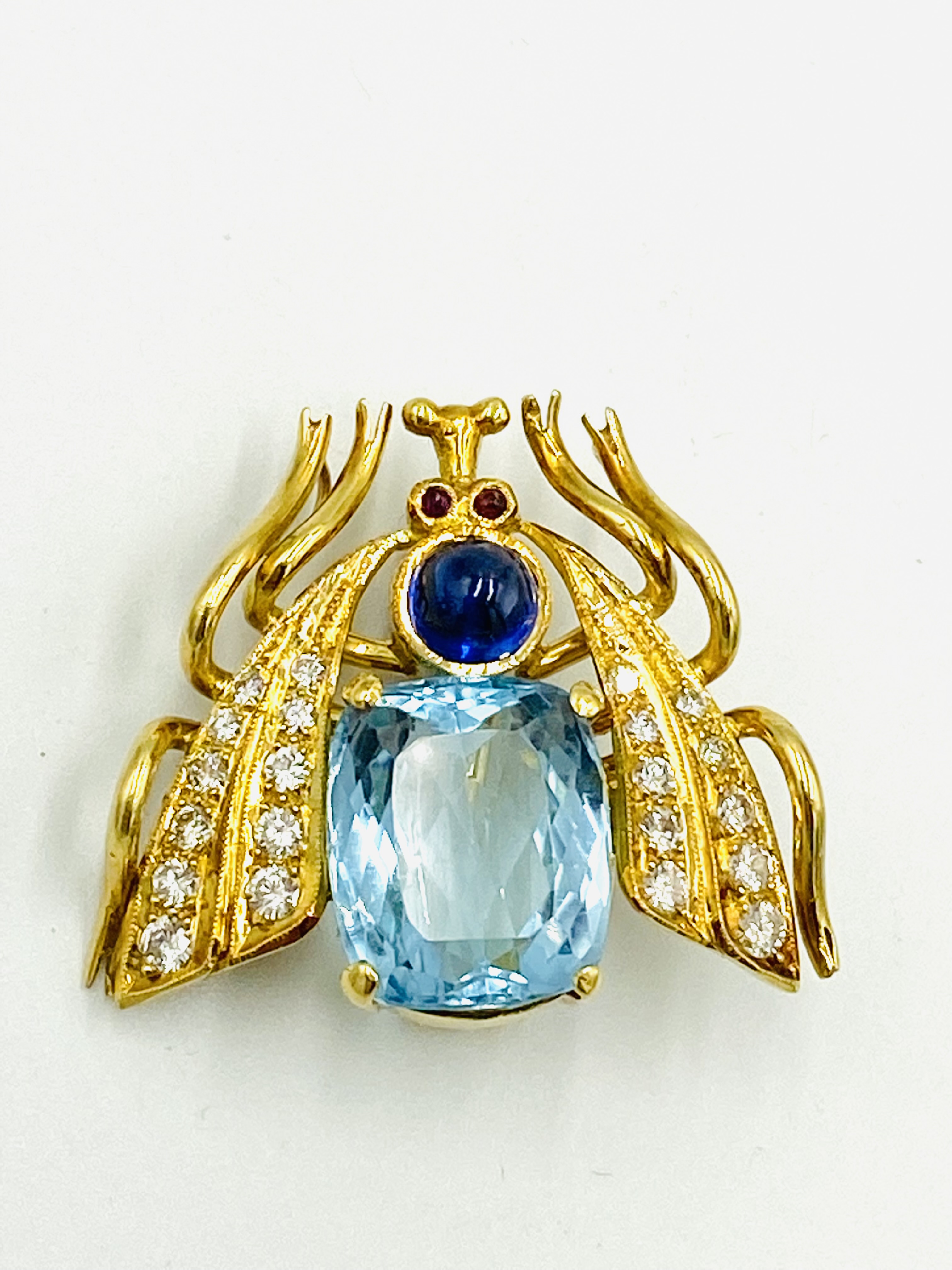 18ct gold gem set brooch