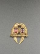 14ct gold, garnet and diamond brooch