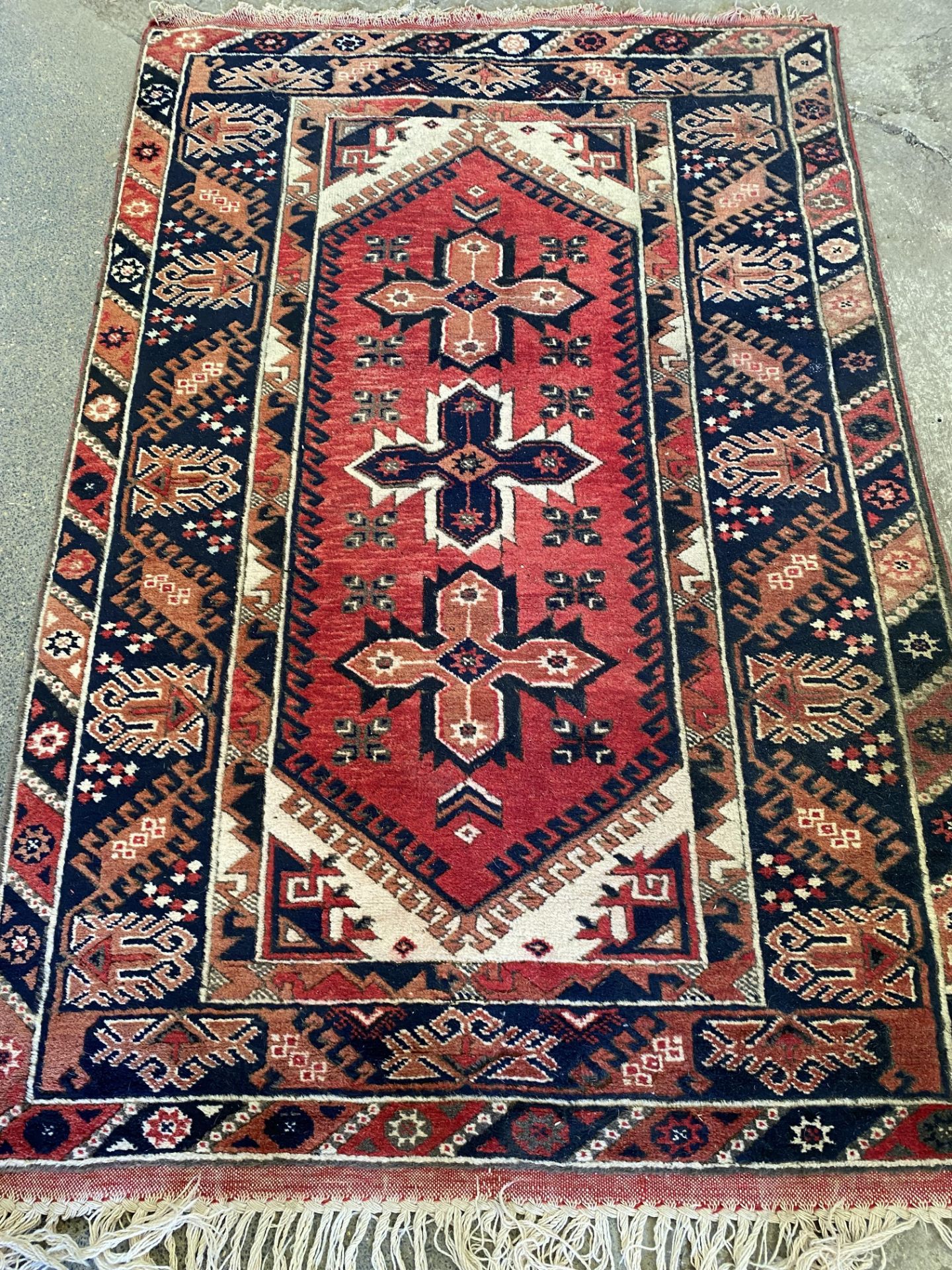 Red ground wool rug