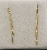 Pair of 9ct gold (tested) earrings