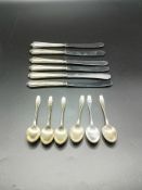 Six silver tea spoons together with six silver handled knives