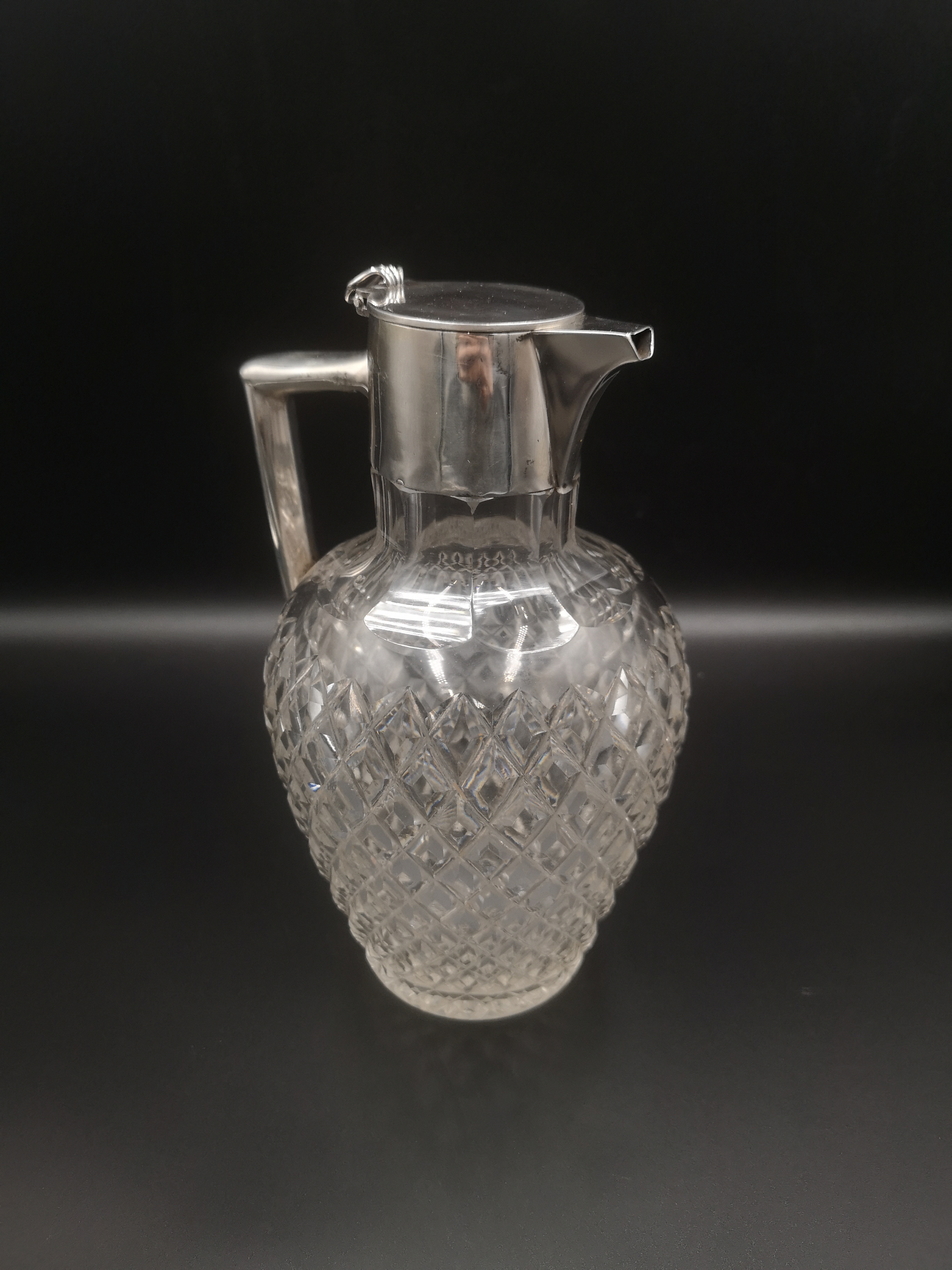 Walker and Hall cut glass and silver claret jug.