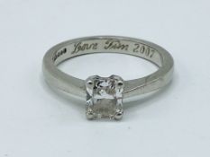 Hallmarked platinum solitaire ring