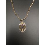 Yellow metal necklace with 9ct gold pendant