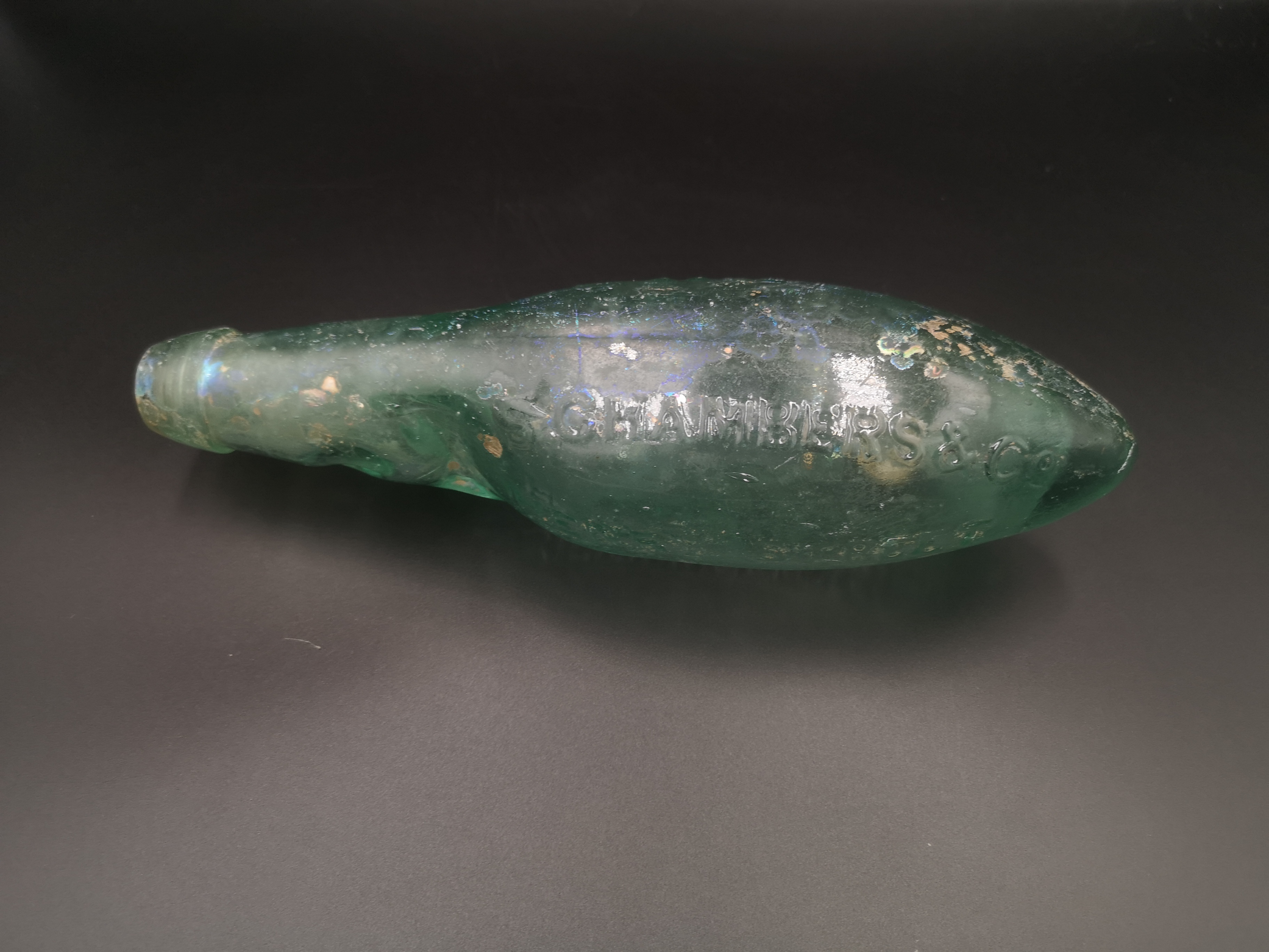 A Codd's patent glass bottle