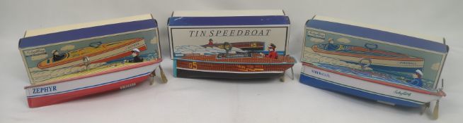 Three Schylling tinplate clockwork speedboats,