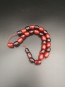 Mixed cherry bakelite amber worry beads