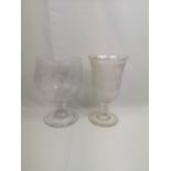Two cut glass vases on pedestal bases