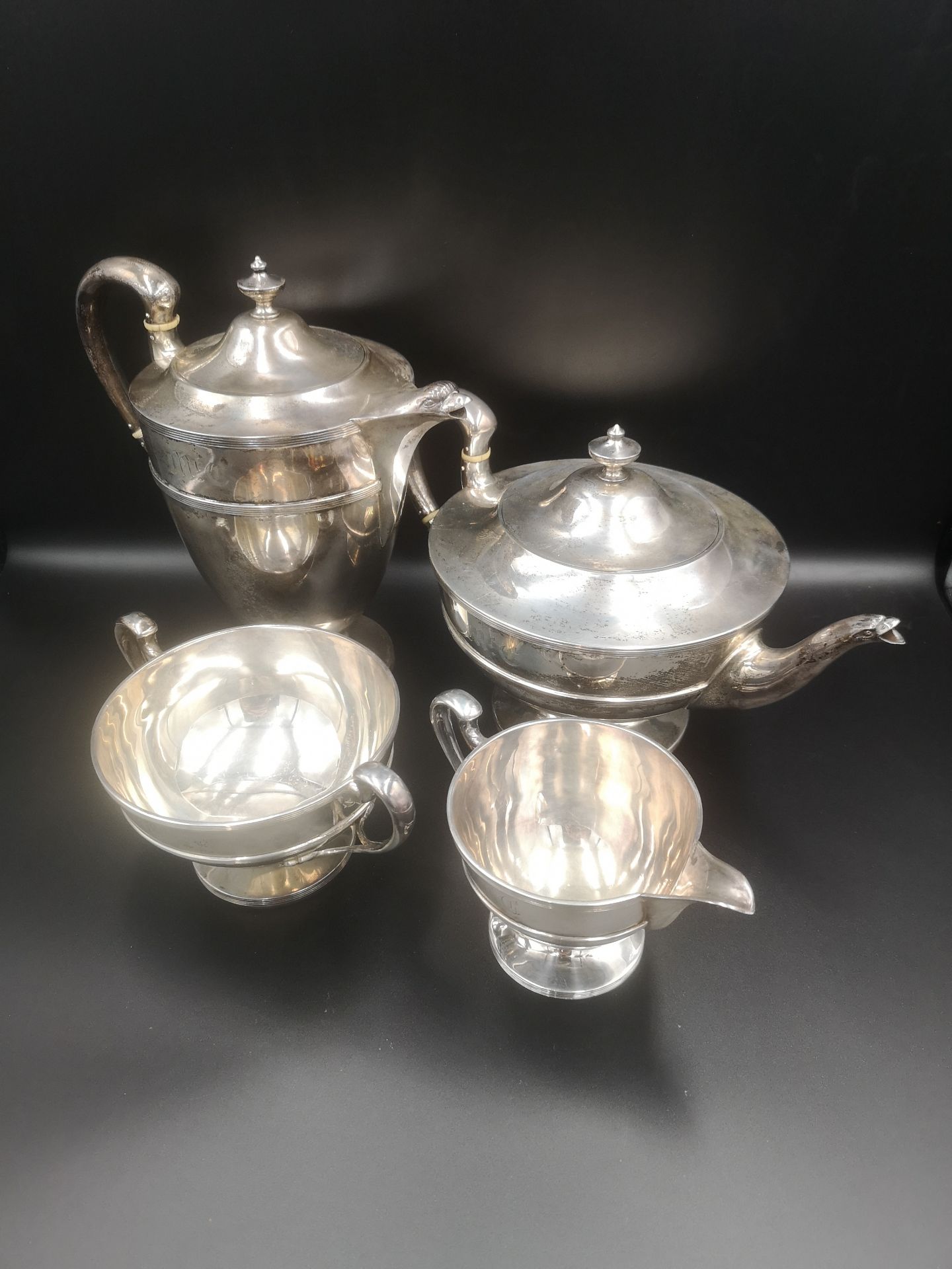 Four piece silver tea set