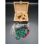 A malachite graduated bead necklace and items of costume jewellery