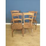 Four unmatched kitchen chairs