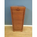 Oak tambour fronted chest of drawers