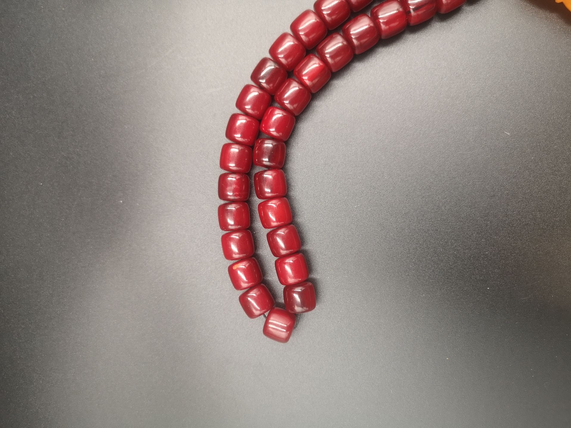 Cherry amber bakelite worry beads - Image 2 of 4