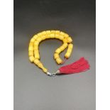Yellow amber resin worry beads