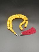 Yellow amber resin worry beads