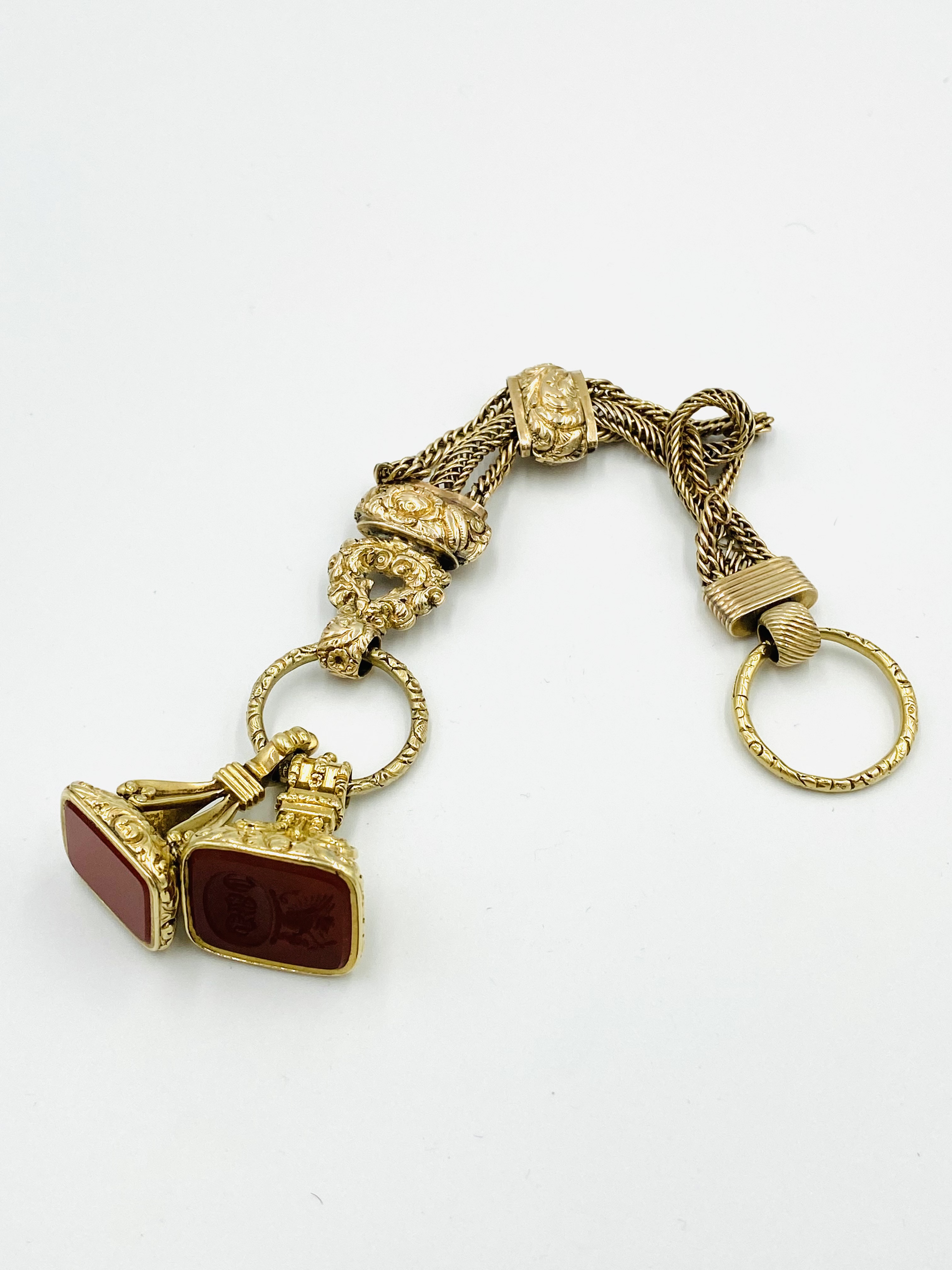 Gold fob chain with two seals