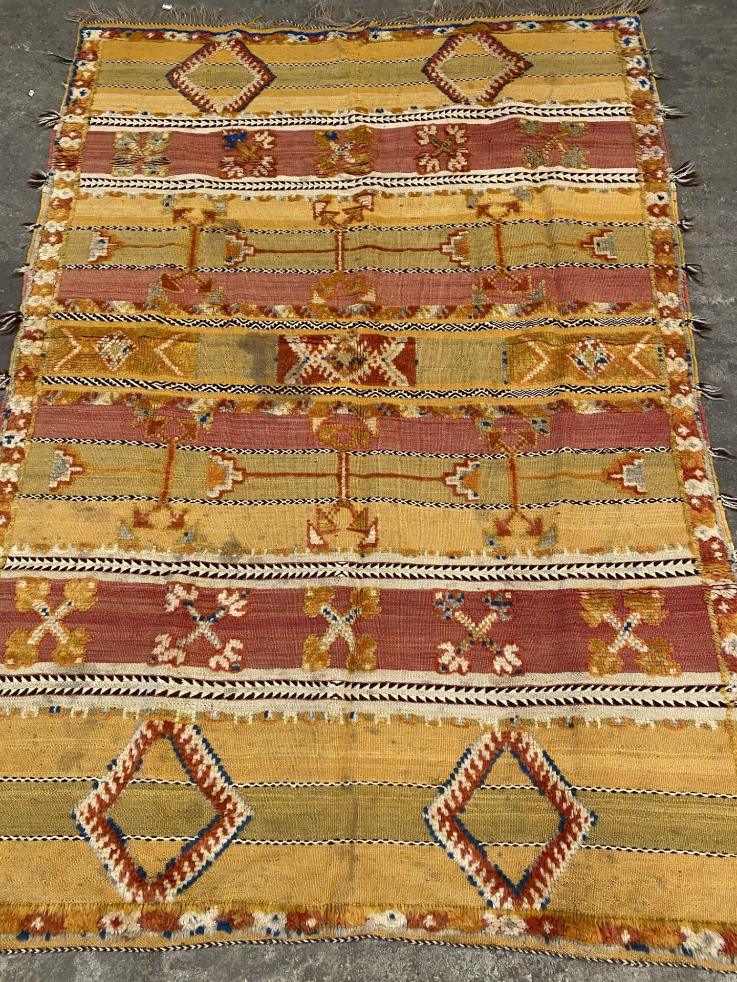 Hand made yellow ground rug