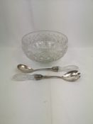 Cut glass salad bowl together with a pair of salad servers