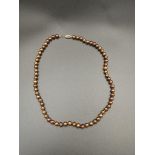 Bronze pearl necklace with 10ct gold clasp