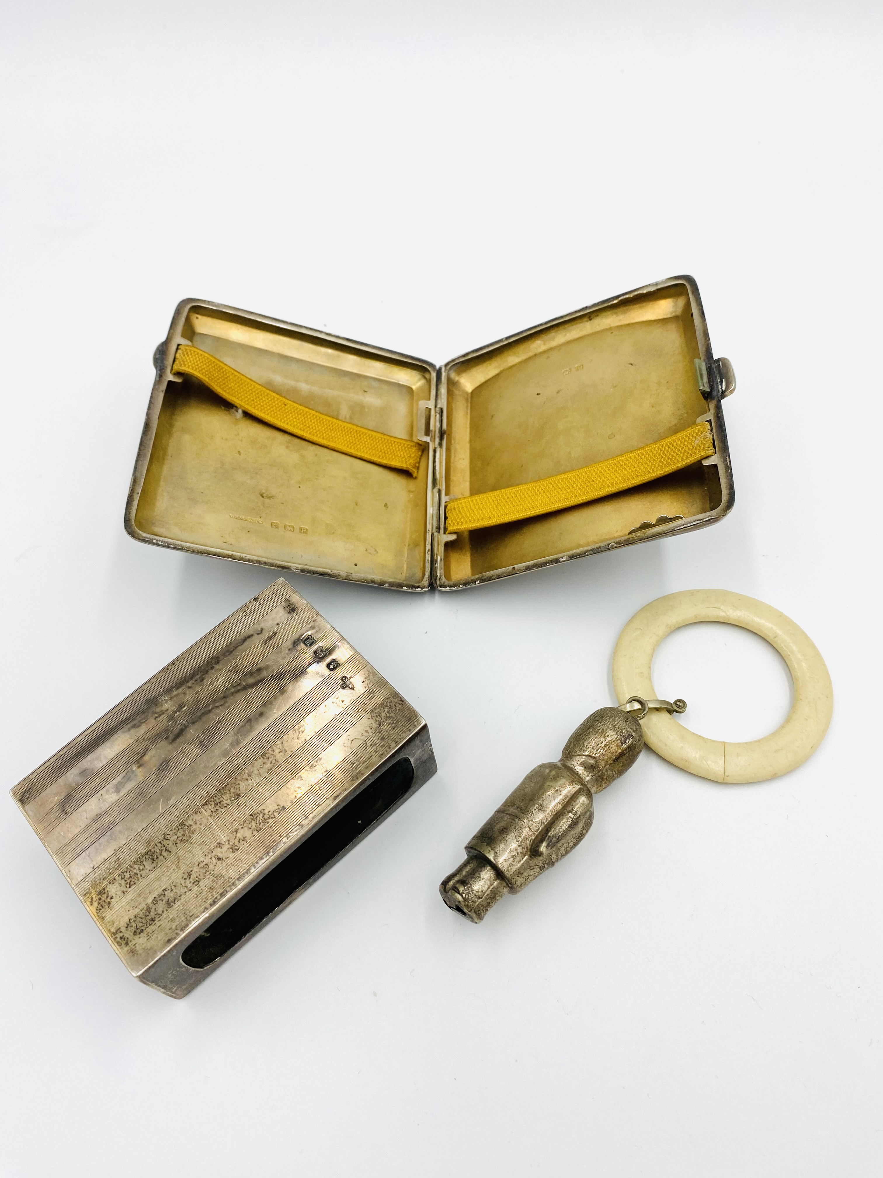 Silver cigarette case and matchbox holder together with an EPNS teething ring - Image 2 of 4