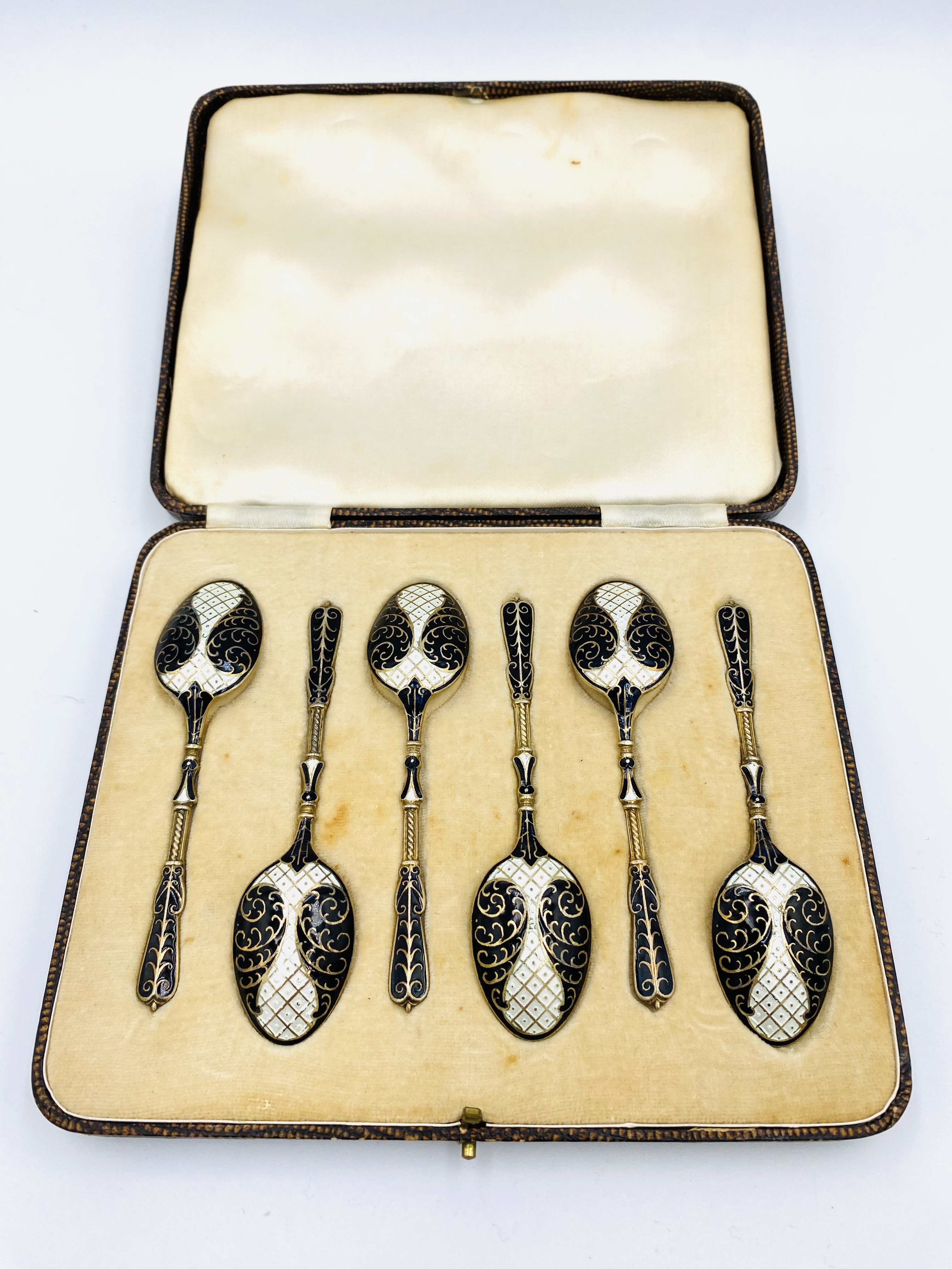 Boxed set of six silver and enamel tea spoons