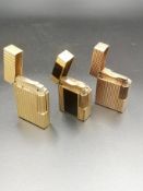 Three gold plated Dupont lighters