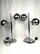 Pair of contemporary chrome style table lamps