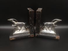 Pair of pewter and wood bookends