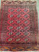 Red ground wool rug