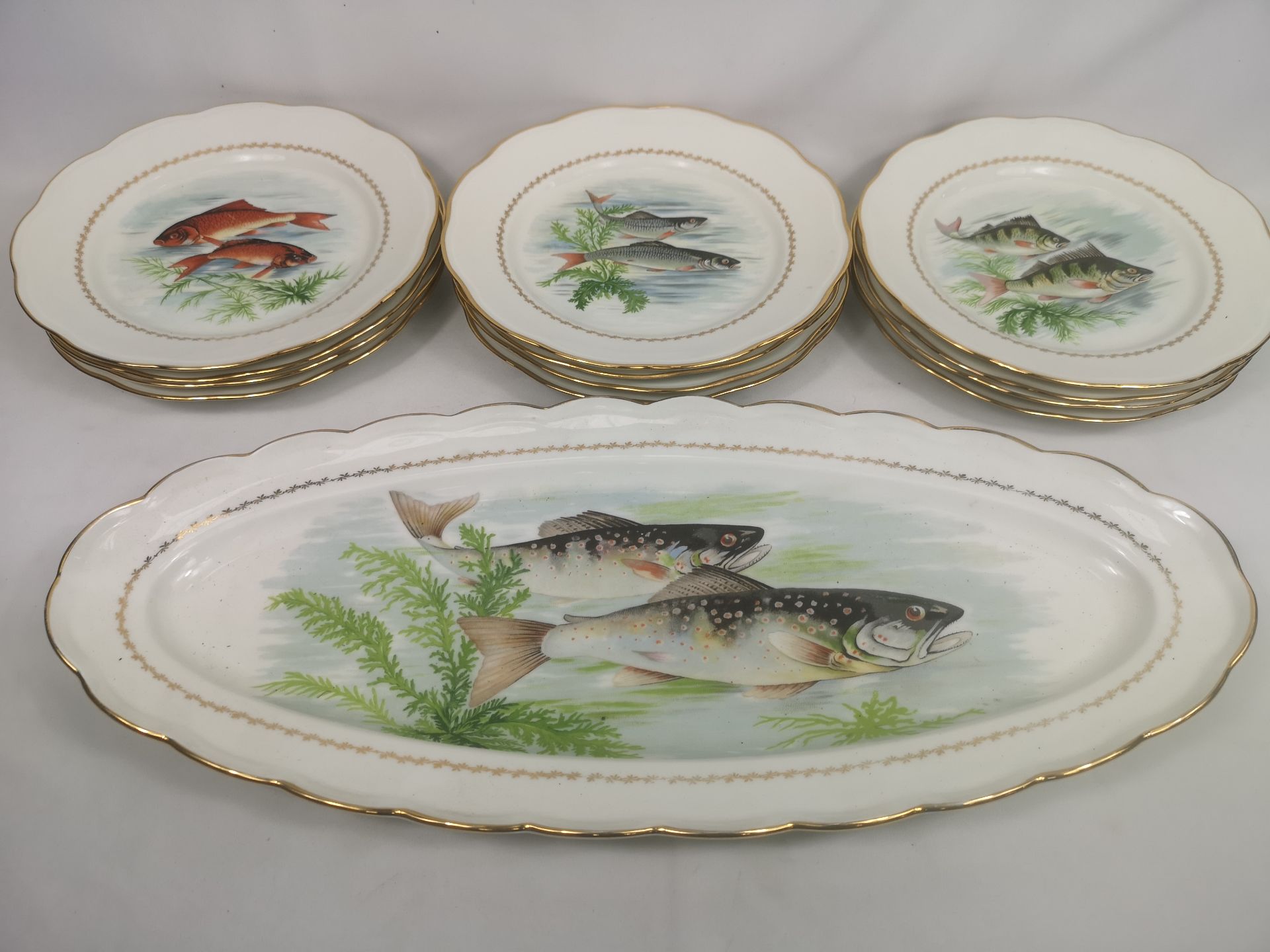 Six hand painted plates