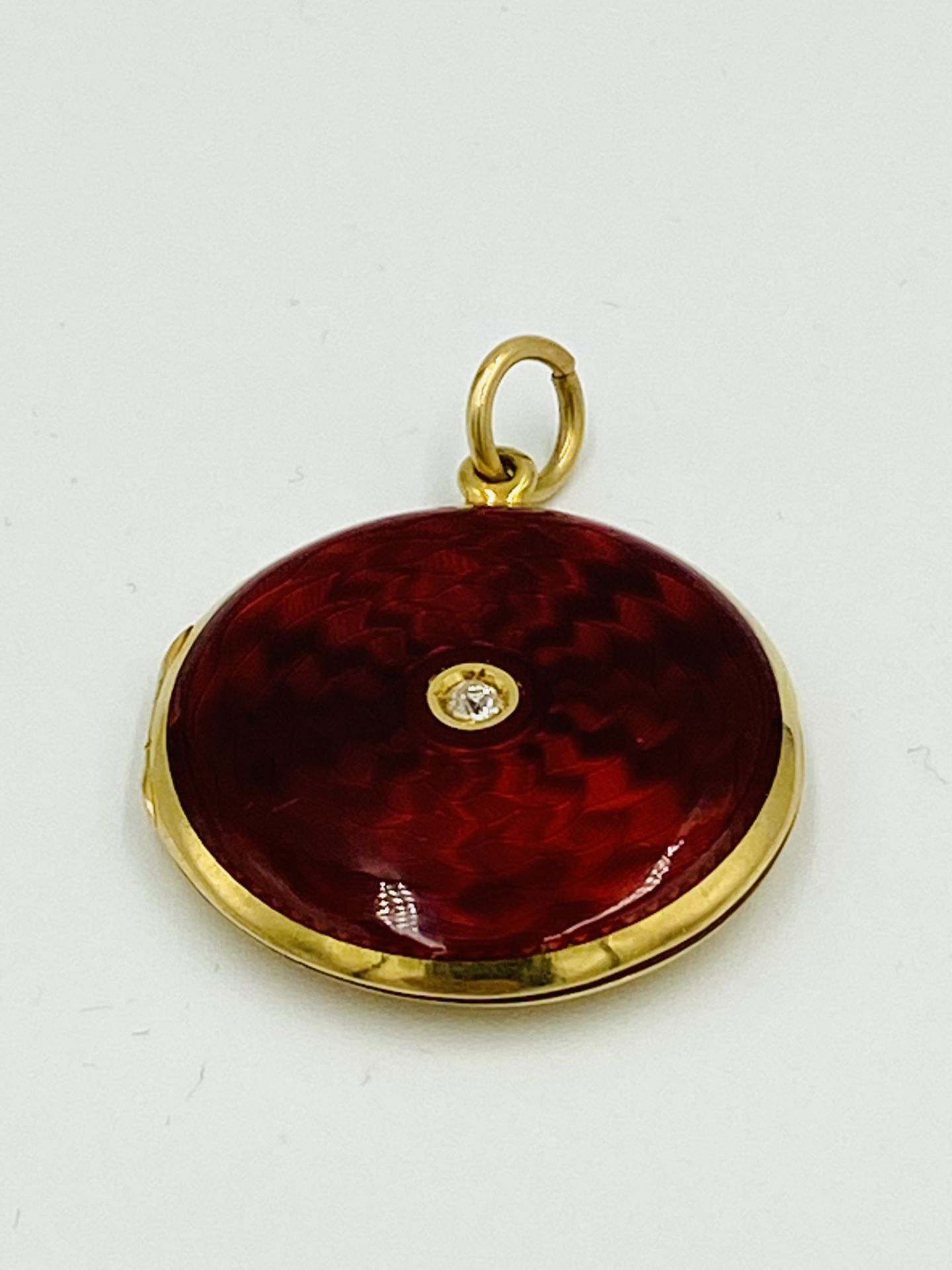 18ct, diamond and enamel locket/pendant