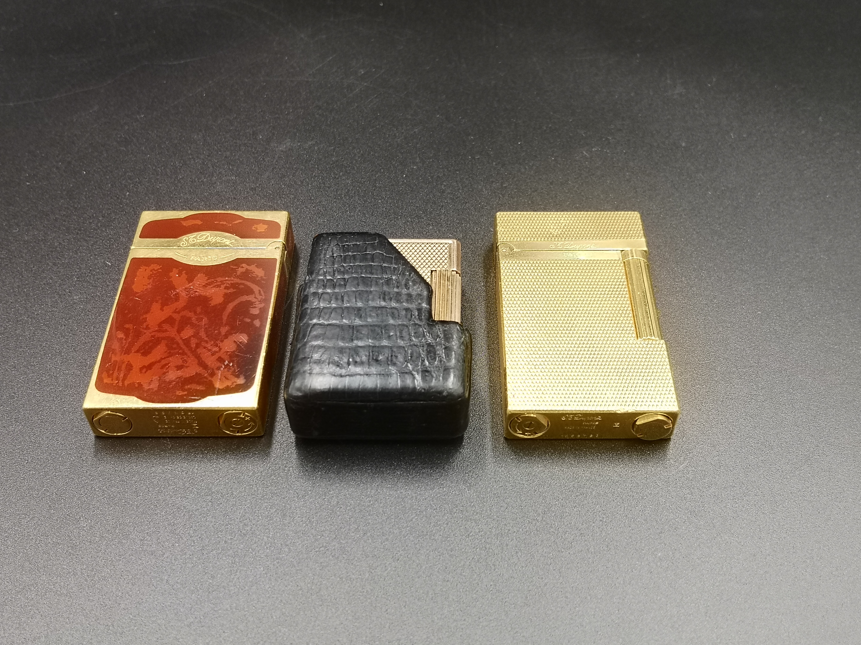 Three gold plated Dupont lighters