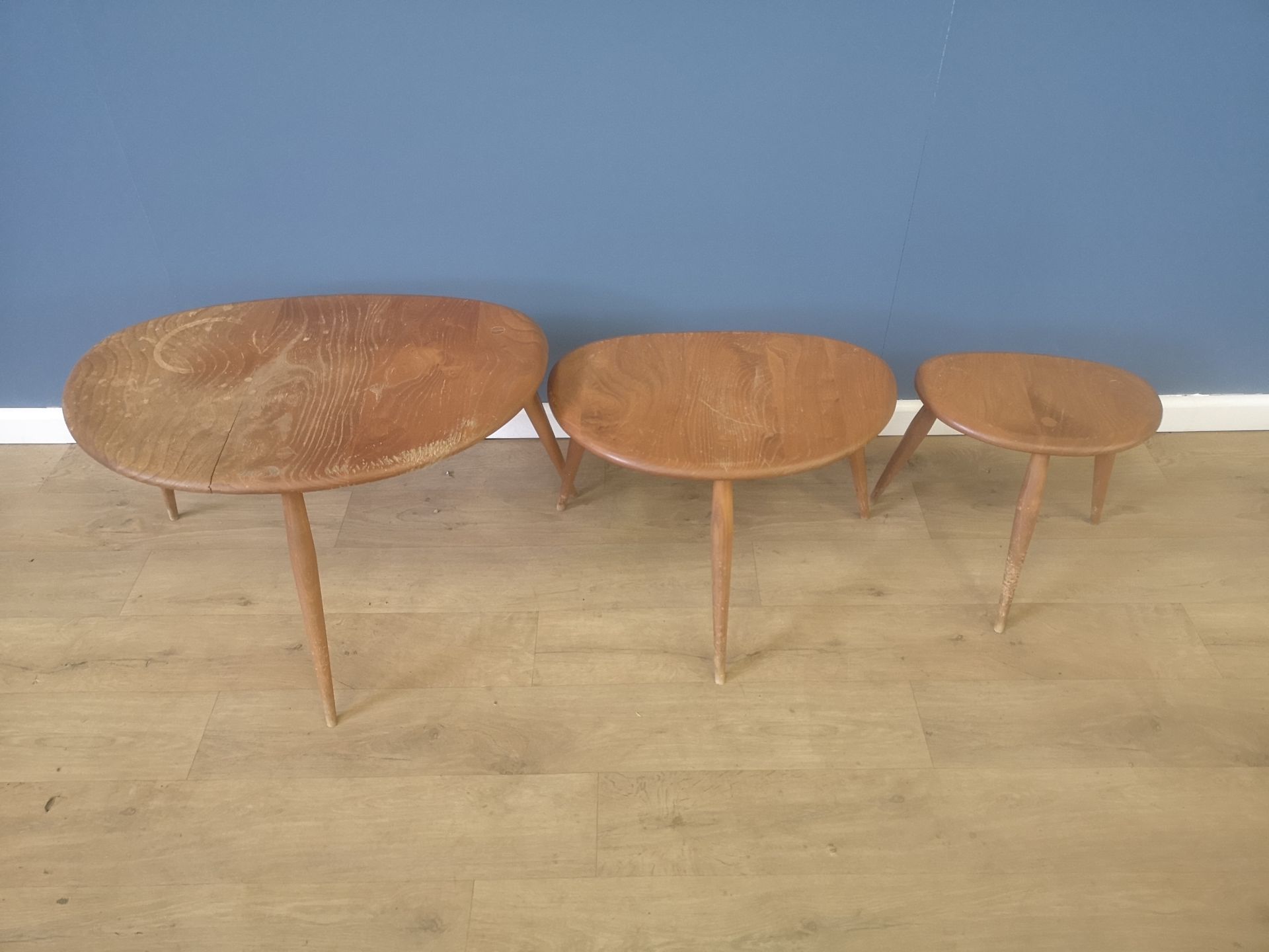 Nest of three Ercol pebble tables