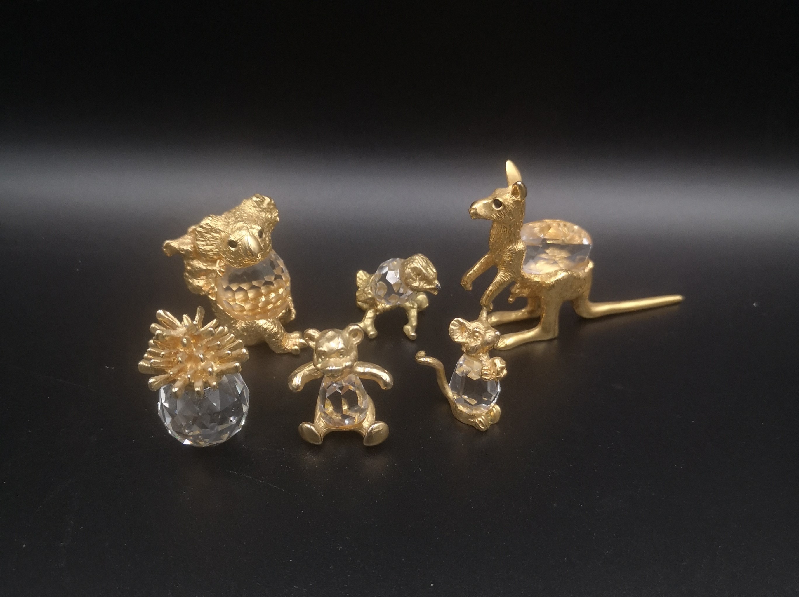 Six crystal animals with gilt metal mounts