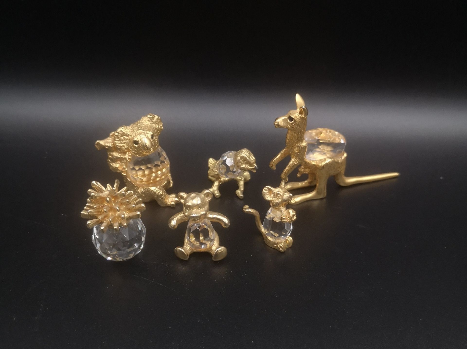 Six crystal animals with gilt metal mounts