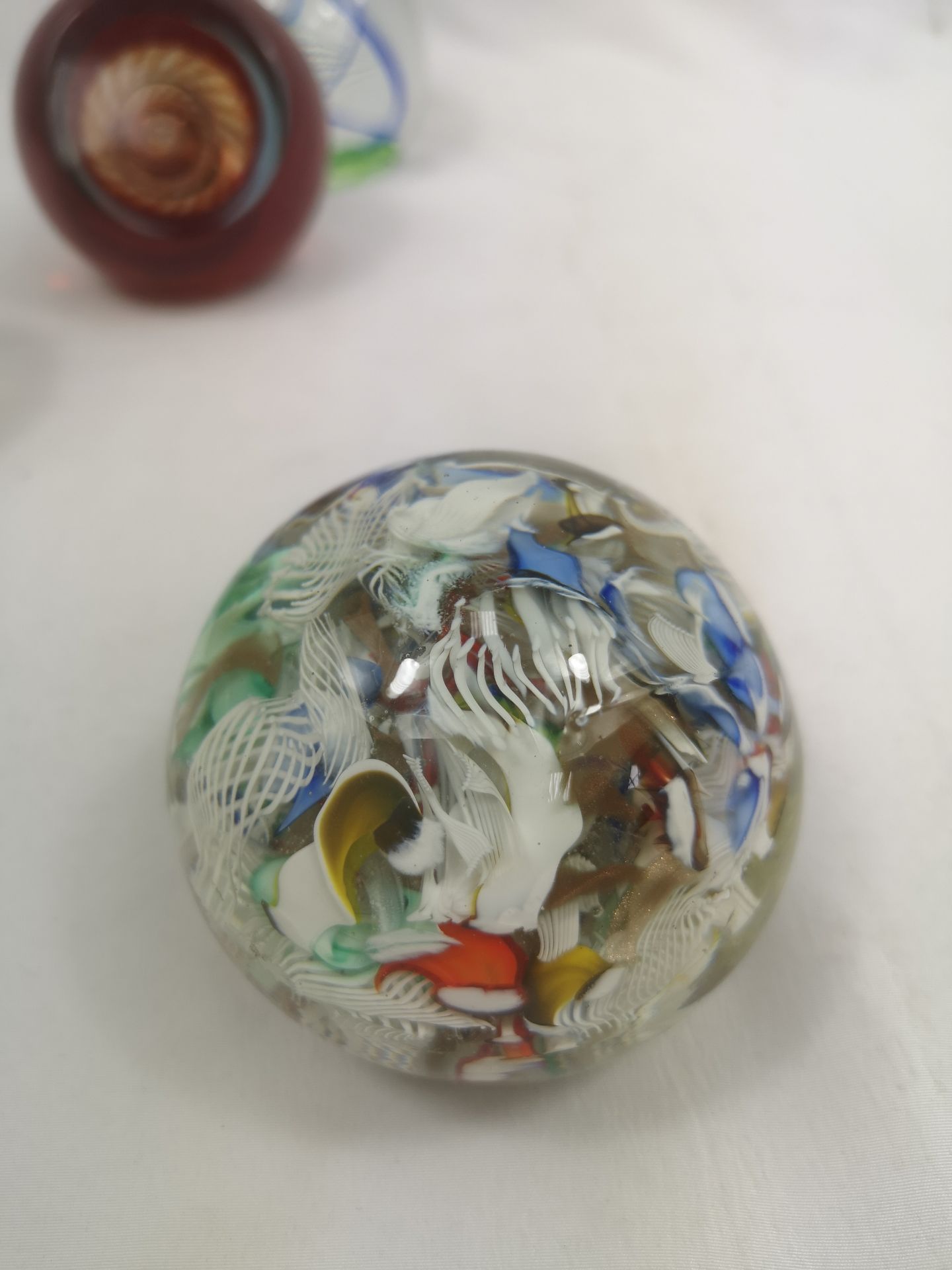 Collection of 6 glass paperweights to include 3 Caithness - Image 5 of 7