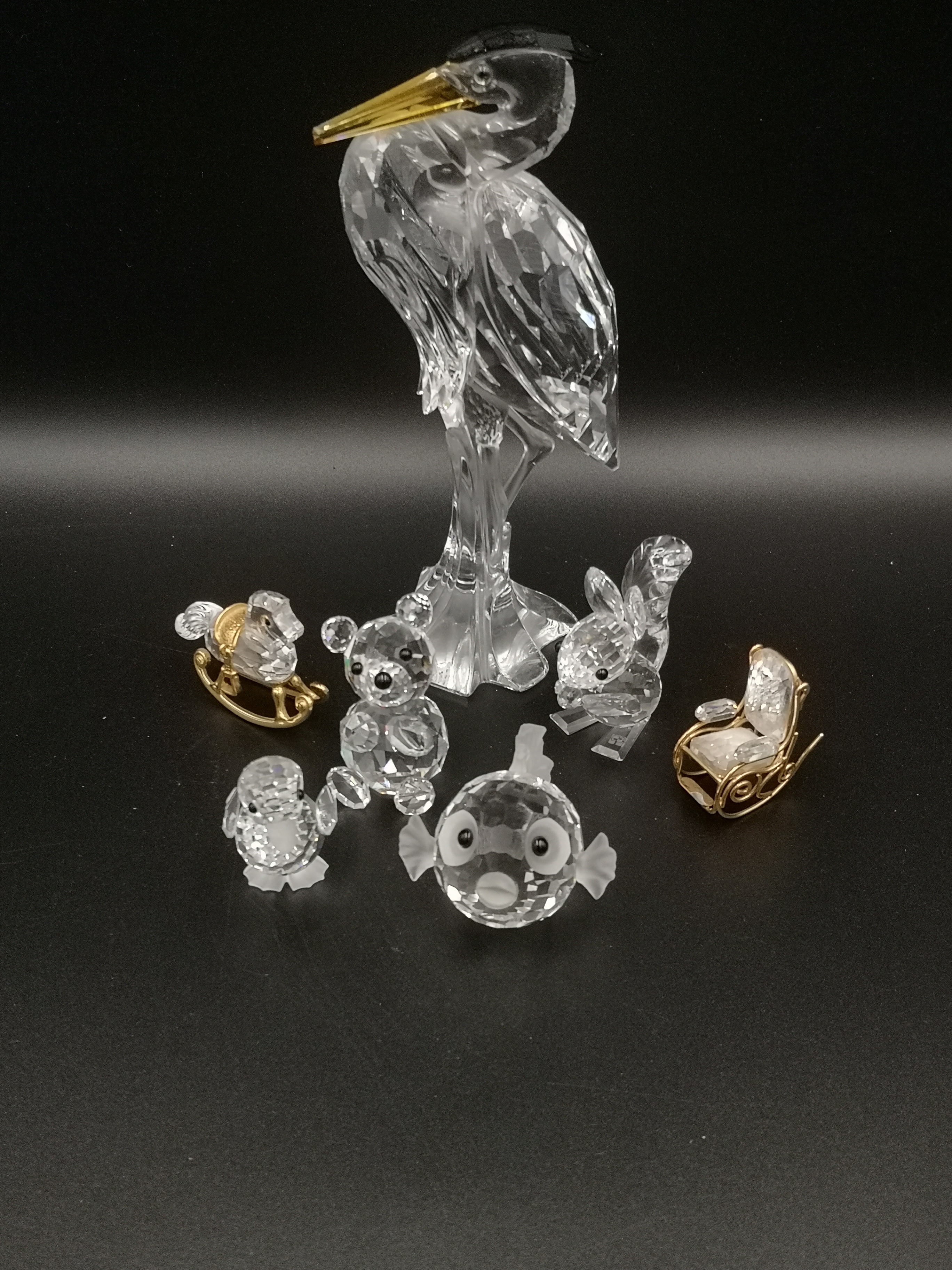 Seven Swarovski glass figurines