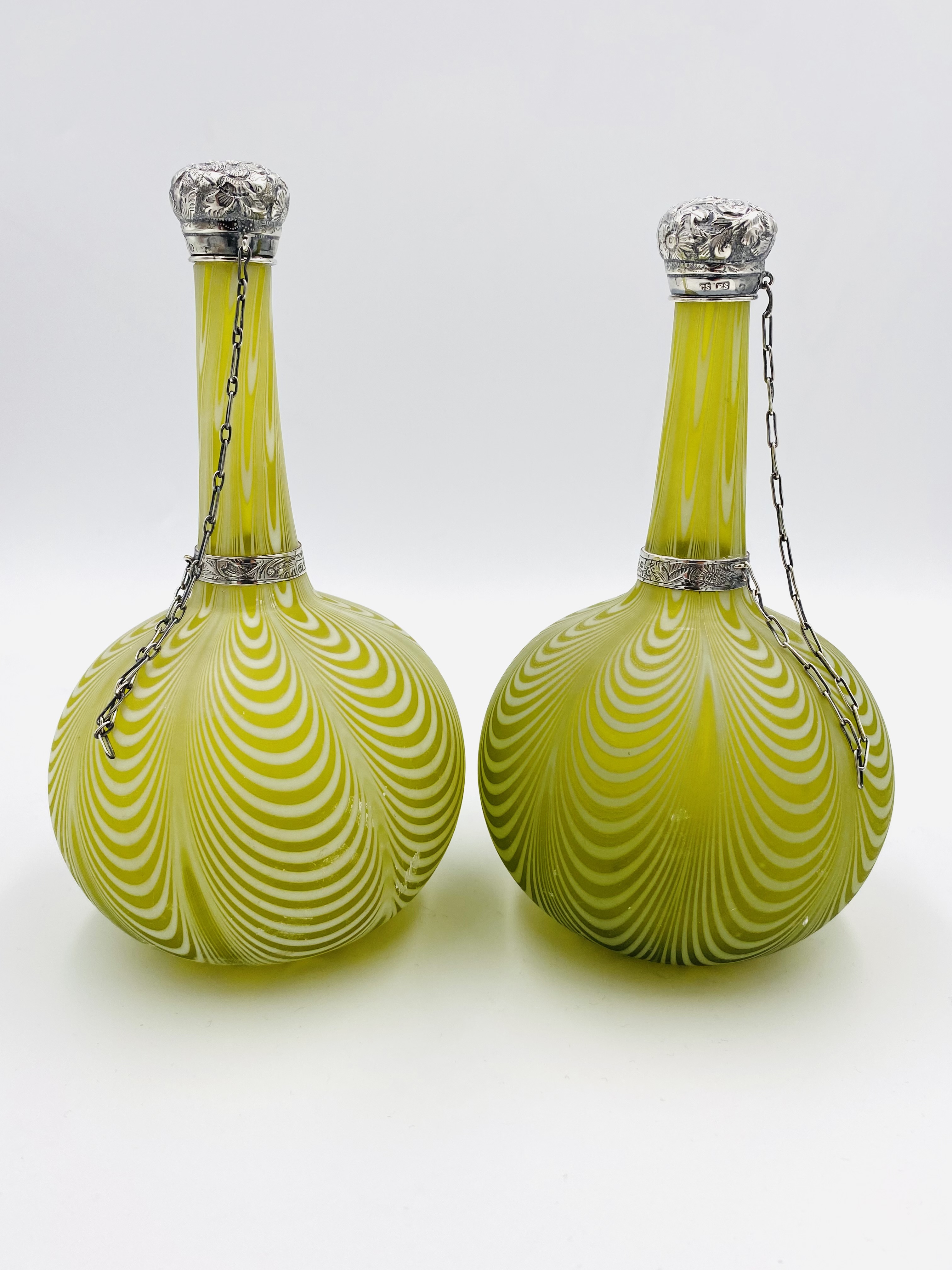 A pair of glass perfume bottles with silver tops - Image 2 of 4