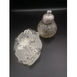 Cut glass perfume bottle together with a white metal filigree tray