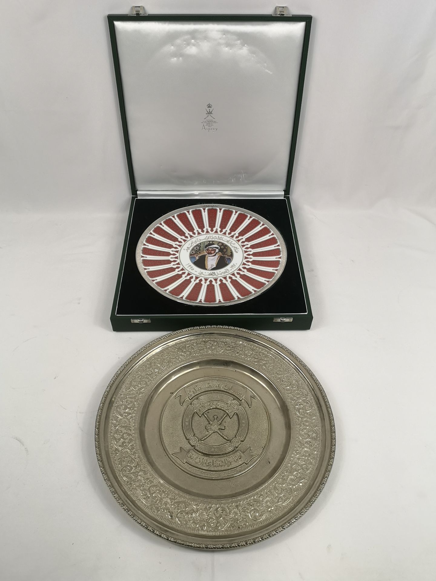 Asprey porcelain plate together with a Middle Eastern silver plate tray