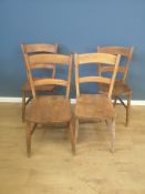 Four unmatched kitchen chairs