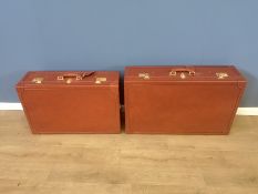 Two Asprey hard sided leather suitcases