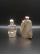 Glass and silver hip flask together with a silver plate flask