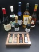 Two bottles of Champagne, four bottles of wine and four port miniatures