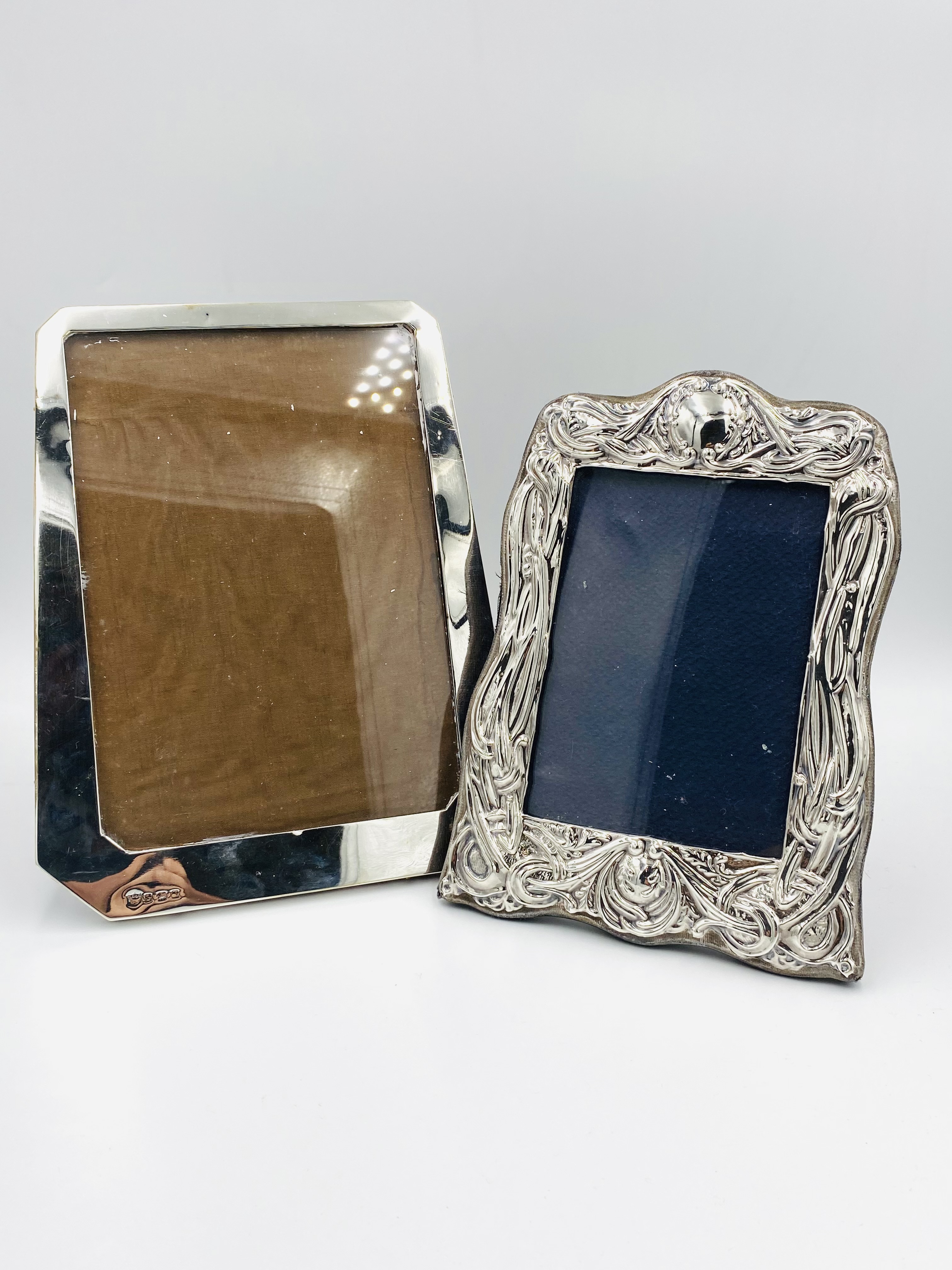 Two silver photograph frames