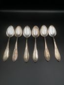 Six silver dessert spoons