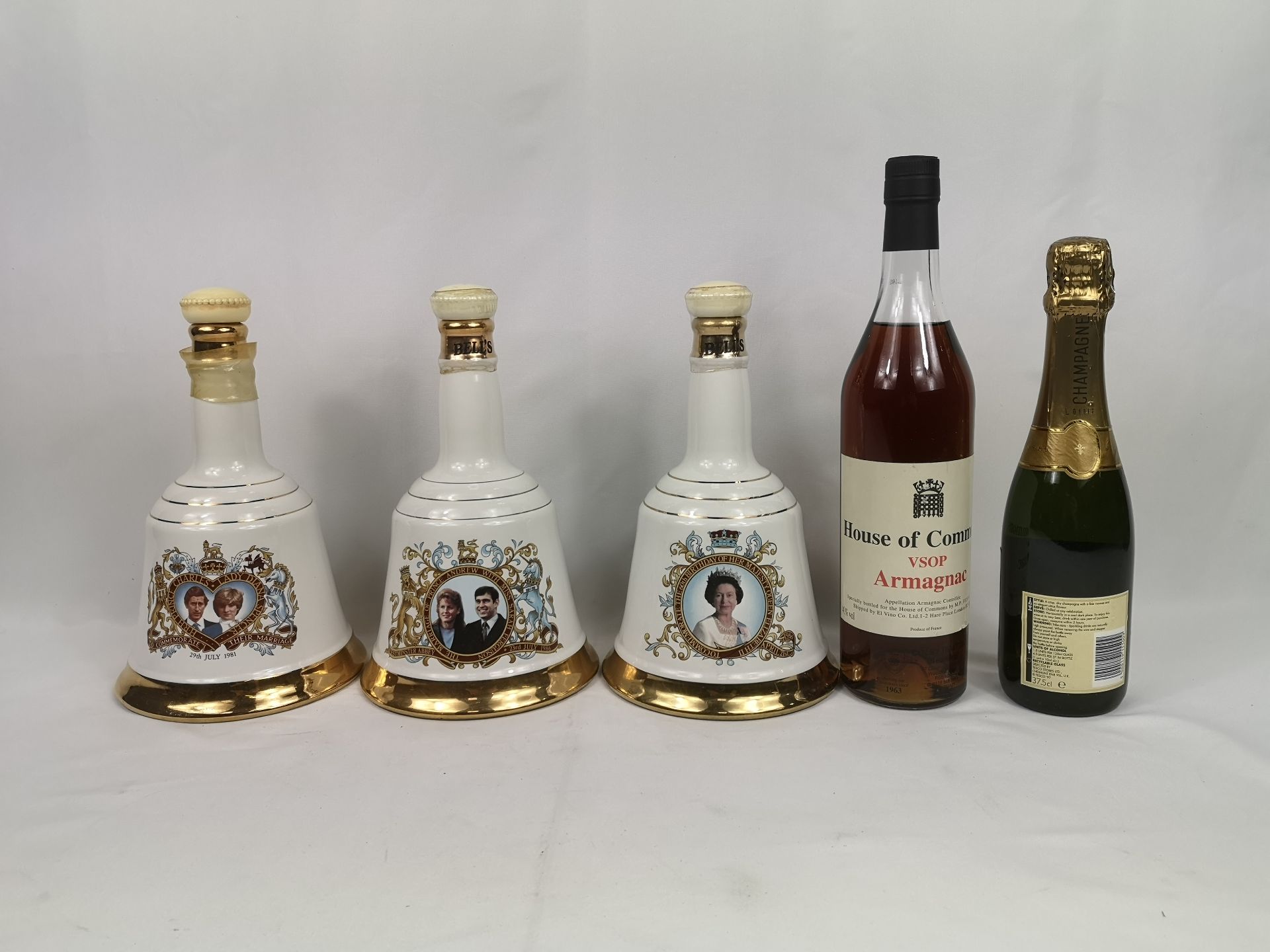 Three Bells porcelain whisky decanters, bottle of House of Commons Armagnac