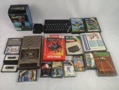 Sinclair ZX Spectrum with power pack, games and cassette player